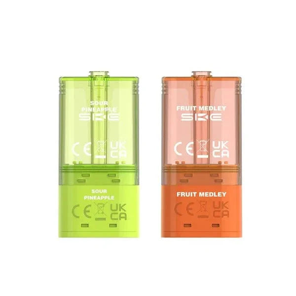 Two vape pods, one green and one orange, with 'Sour Pineapple' and 'Fruit Medley' labels on a white background.